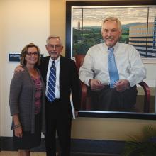 2208 Glenn & Lisa Steele with portrait at the dedication ceremony 150618
